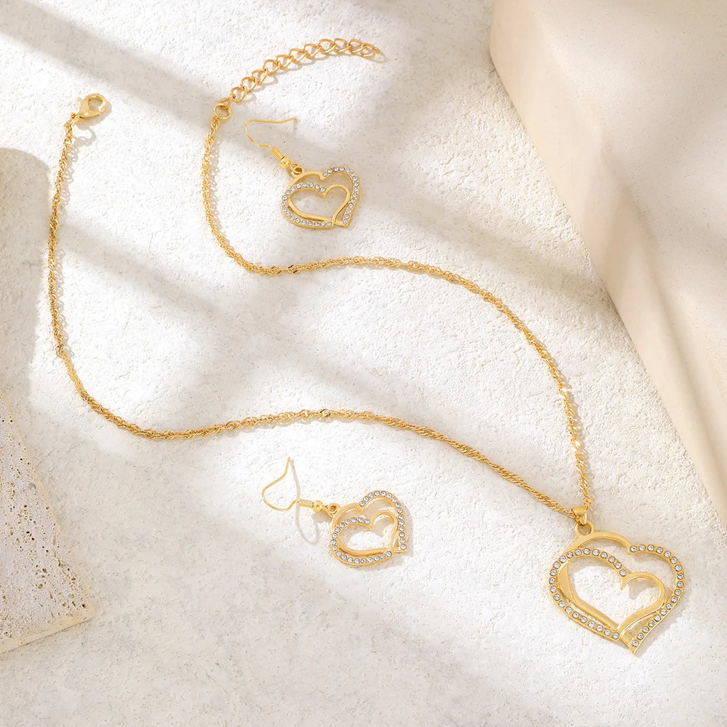 Women’s Double-Layer Hollow Heart Pendant Necklace with Rhinestones