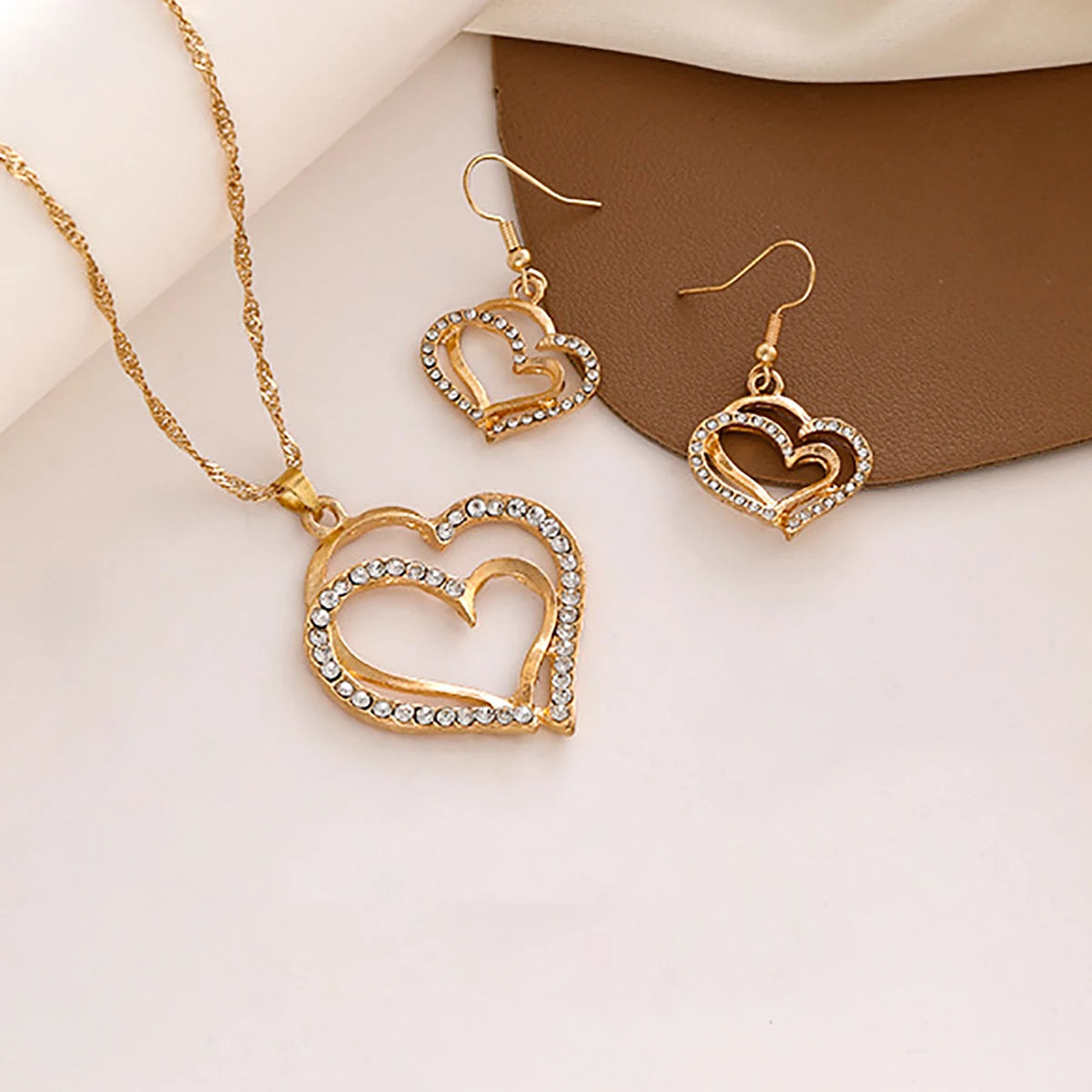 Women’s Double-Layer Hollow Heart Pendant Necklace with Rhinestones